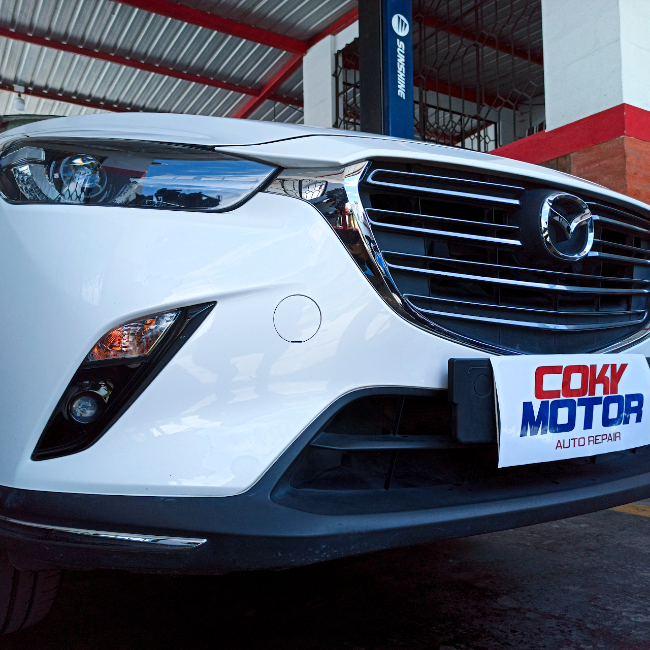 Taller mecánico con tecnología de punta COKY MOTOR